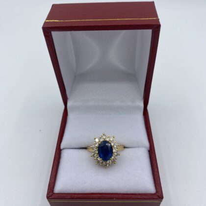 Bague-marguerite-or-jaune-saphir-sertie-diamants