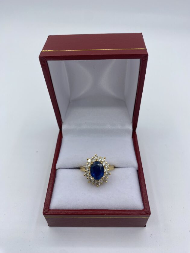 Bague-marguerite-or-jaune-saphir-sertie-diamants