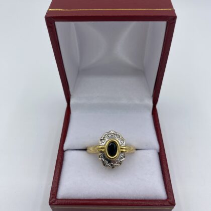 Bague-or-jaune-et-blanc-sertie-saphir