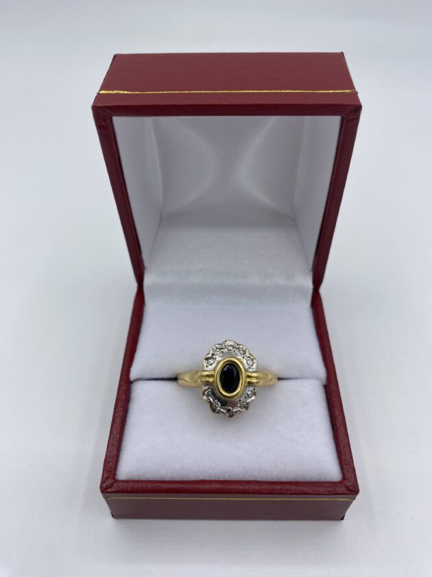 Bague-or-jaune-et-blanc-sertie-saphir