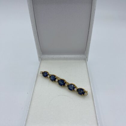 Broche-or-jaune-5-saphirs-et-6-diamants