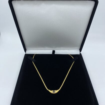 Collier-or-jaune-sertie-saphir