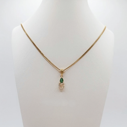 Collier or jaune sertie d'un pendentif Diamant de 0,95 carats et Emeraude