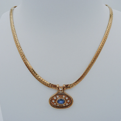 Collier Or jaune 18 carats Maille serpentine sertie de diamants et d'une pierre bleu centrale