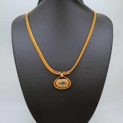 Collier Or jaune 18 carats Maille serpentine sertie de diamants et d'une pierre bleu centrale