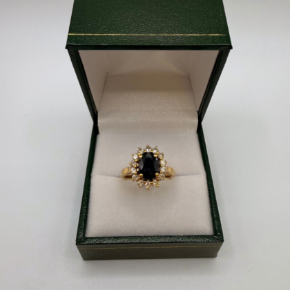 Bague Or jaune 18 carats "marguerite" Sertie d'un saphir et de diamants