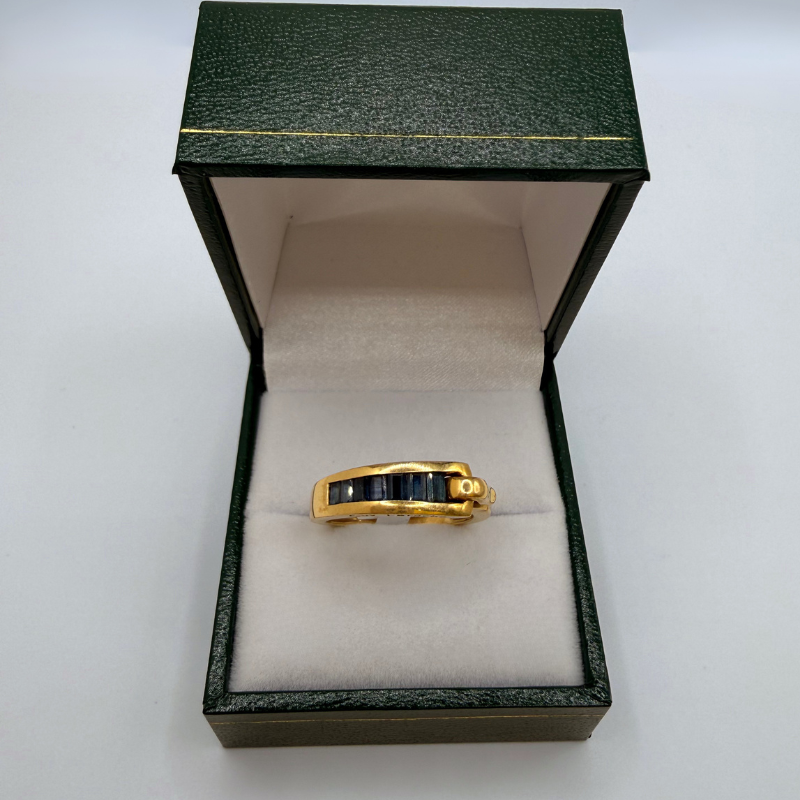 Bague "Guy Laroche" Or jaune 18 carats sertie pierres bleues