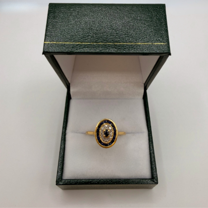 Bague Or jaune 18 carats sertie de pierres bleues et d'éclats de diamants